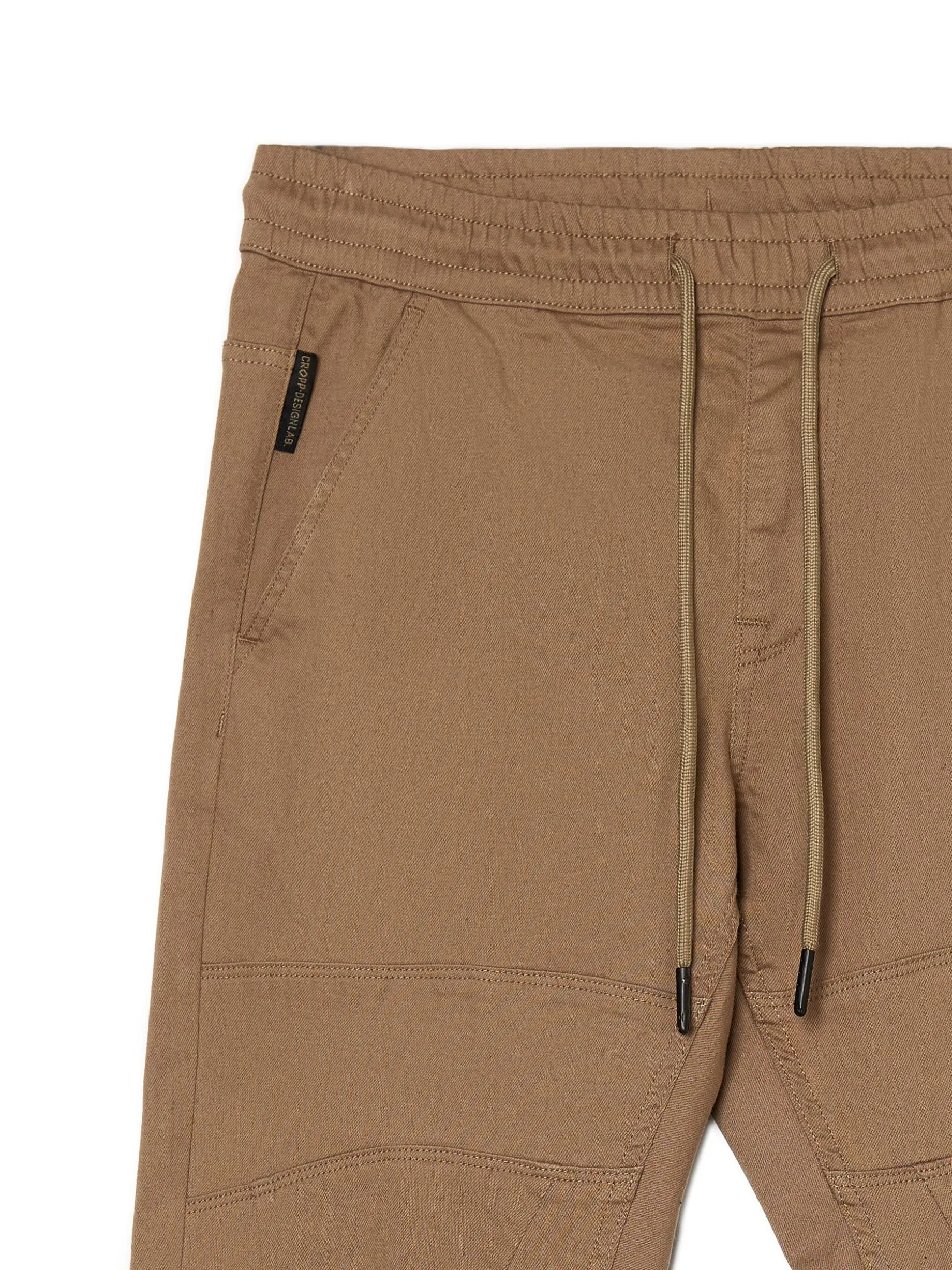 Beżowe joggery z kieszeniami cargo