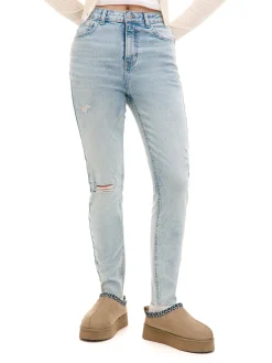 Błękitne jeansy skinny z przetarciami