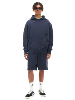 Bluza z kapturem z ozdobnymi wycięciami