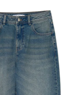 Ciemnoniebieskie jeansy straight z efektem sprania