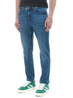 Granatowe jeansy slim