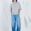 Niebieskie jeansy skater z efektem sprania