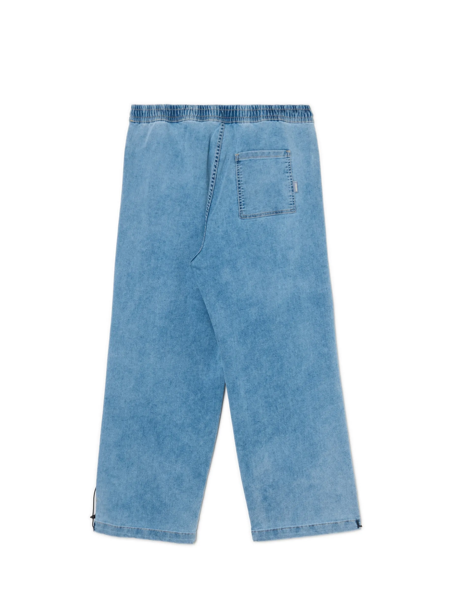 Niebieskie jeansy typu parachute