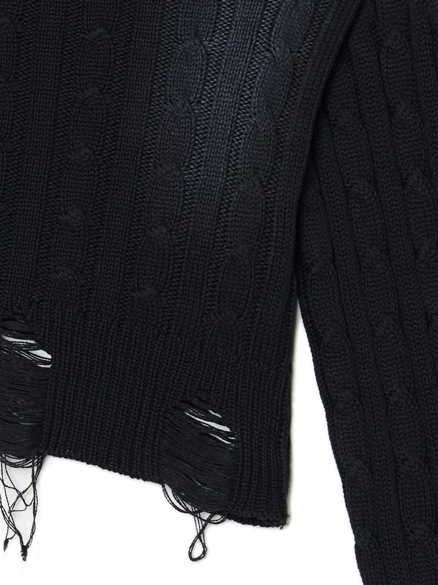 Sweter z miejscowym efektem wybielenia